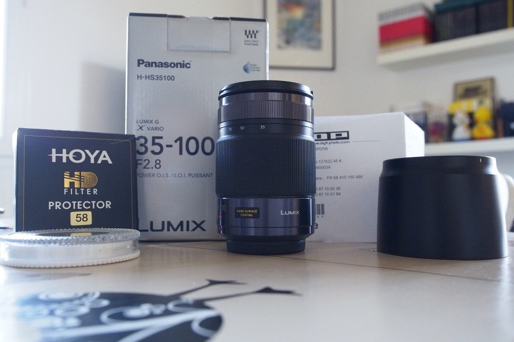 ( A Vendre) Lumix 35-100 mm F2.8 + Hoya protector HD 0iea