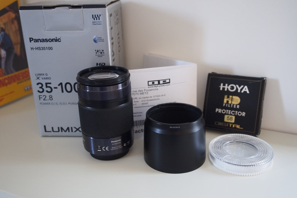 ( A Vendre) Lumix 35-100 mm F2.8 + Hoya protector HD Amq2